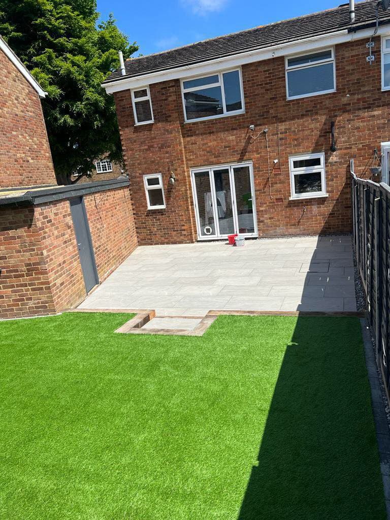 Garden transformation with premium slabbing and grass in Maidstone